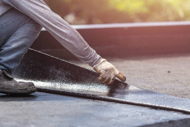 Professional Basement Waterproofing technician working in Santa Fe, TN